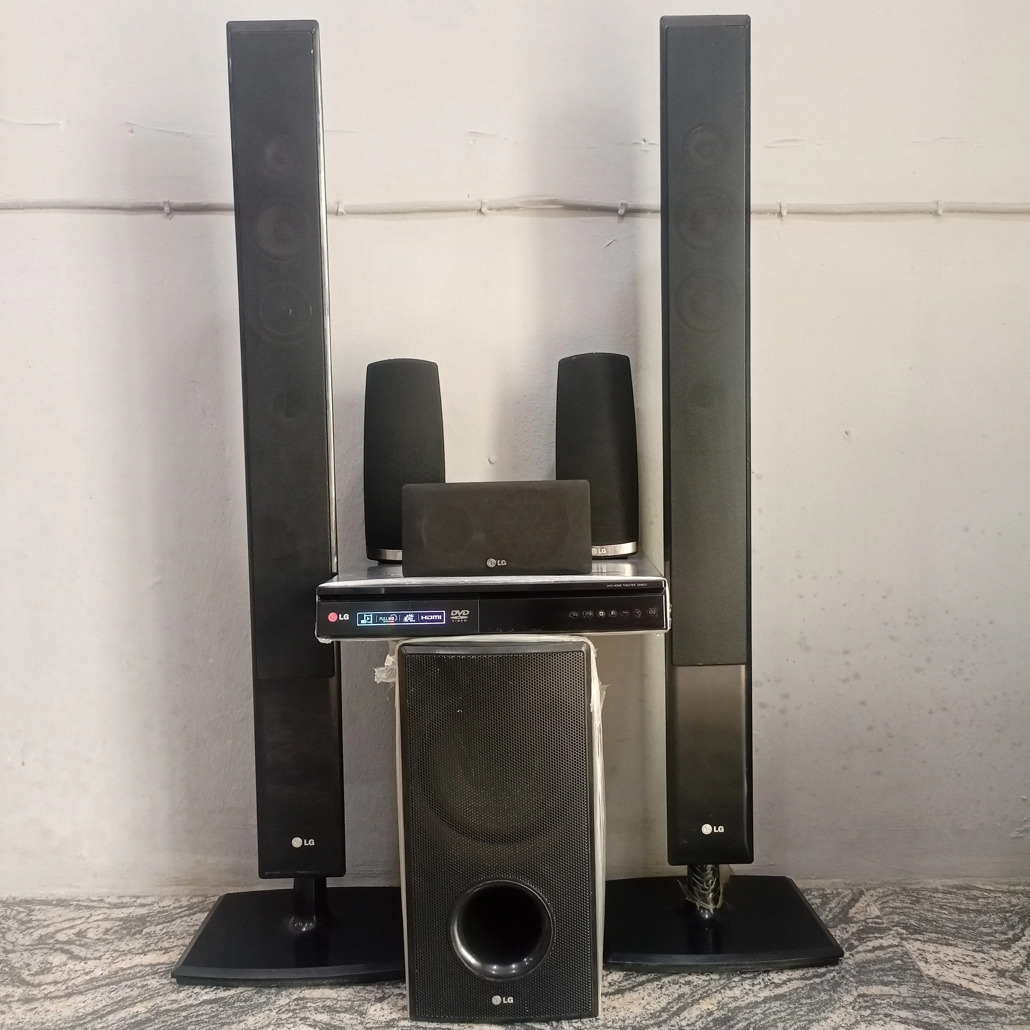 LG 5.1Ch 1000W Tower Bluetooth DVD Home Theater System (USB, FM, Aux, Optical, HDMI Out) - Foreign Used