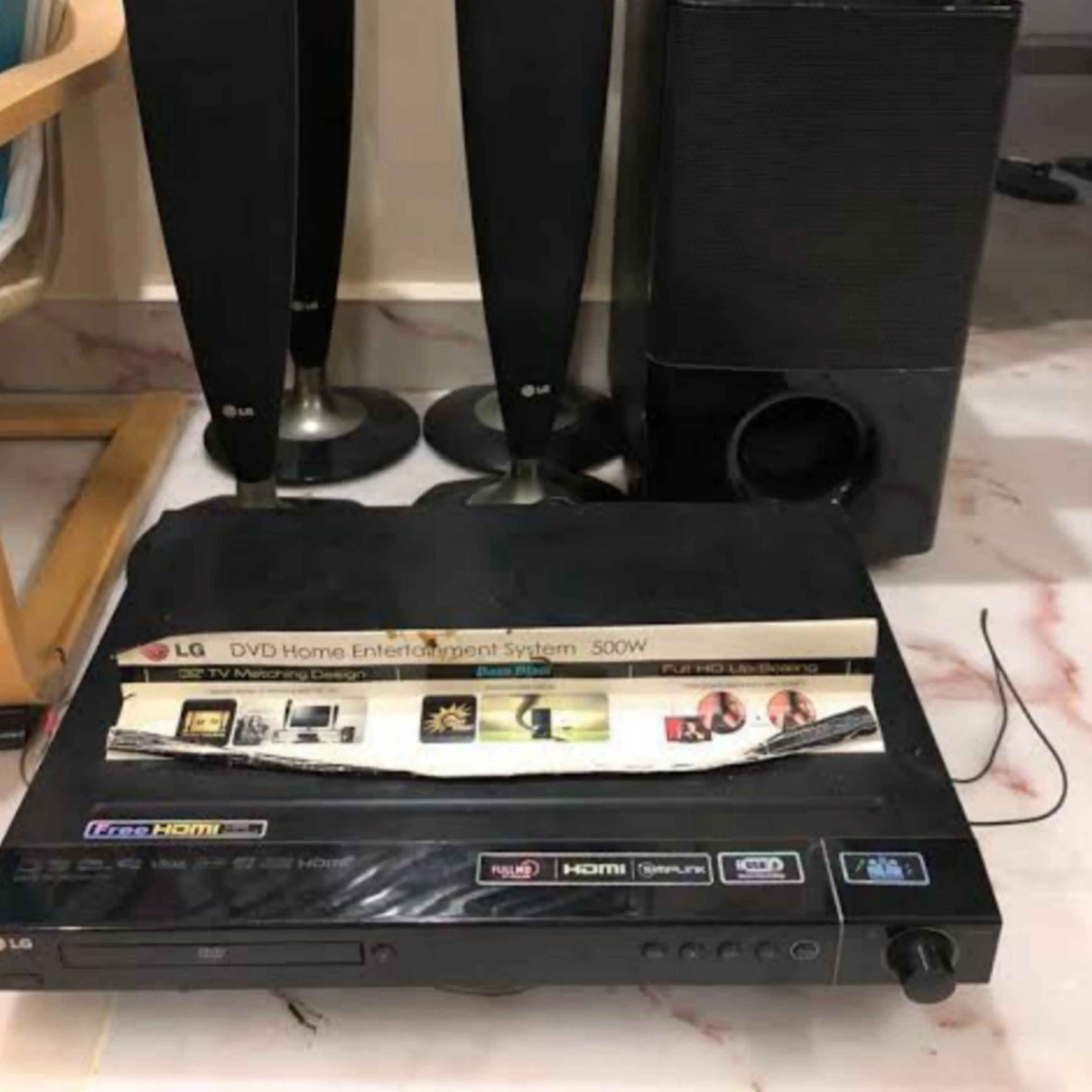 LG HT554TM 5.1Ch 500W Tall Boy DVD Home Theater System (USB, FM, Aux, Optical, HDMI Out) - Foreign Used